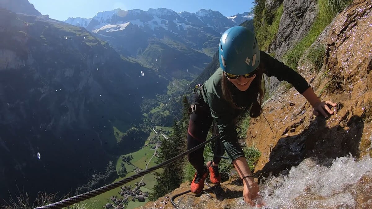 OUTDOOR Adventure Is drinking from a waterfall on a via ferrata